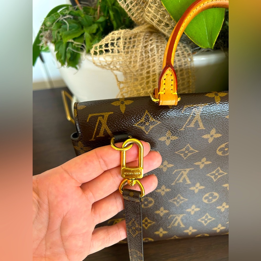 Louis Vuitton
Marignan Handbag Monogram Canvas with Leather $1600 - Picture 11 of 16